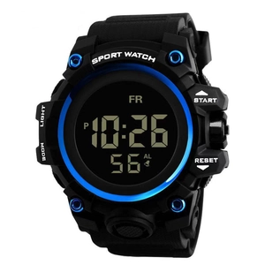 Macro shot of large digital sports watch dial with blue metal ring and LCD function display
