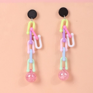 Detail of colorful dopamine style U-link chain earrings with pink glitter ball drops
