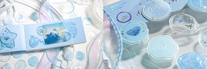 Macro shot of blue resin wax seal stickers with star and flower shapes for DIY scrapbooking