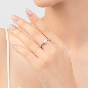 Elegant S925 sterling silver crown engagement ring with sparkling round diamond on finger