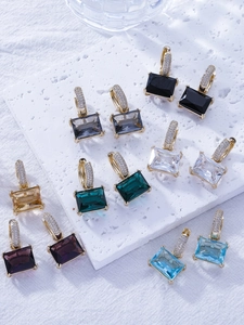 Detailed view of rectangular gemstone earrings in multiple colors with pave zircon hoops