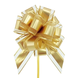 Detailed view of a gold metallic pull bow with sheer mesh edges for gift wrapping