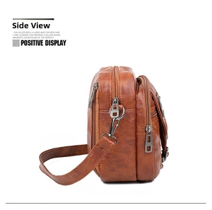 Vue latérale du sac bandoulière en cuir marron avec trois compartiments zippés