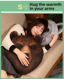 Detail of realistic brown bear plush pillow with 3D animal print texture on a sofa