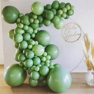 Forest green matte latex balloon arch kit with sage green accents for birthday party decor