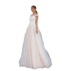 Elegant off-shoulder bohemian wedding dress with lace appliques and layered tulle skirt