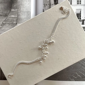 Elegant 925 sterling silver beaded bracelet with heart charm and lobster clasp closure