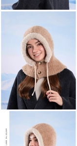 Detail of winter plush balaclava featuring wood texture buttons and lamb wool material
