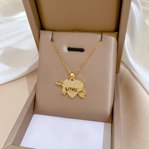 Luxurious gold-plated heart and arrow necklace with crystals and LOVE engraving in a box