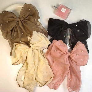 Elegant chiffon bow hair clips with pearls in brown, beige, black, and pink colors
