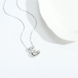 Polished silver 3D balloon initial E pendant necklace on a fine minimalist link chain