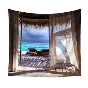 Détail de la texture du tissu d'une tapisserie bohème avec paysage de plage tropicale