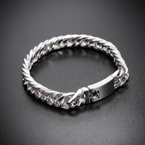 Detailed macro view of 10mm silver Cuban link chain with a heavy-duty mechanical clasp