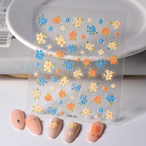 3D floral nail stickers set with orange and blue flowers for DIY manicure art