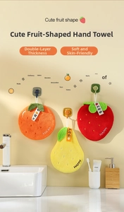 Hanging thick coral velvet hand towels with fruit shapes like strawberry and orange