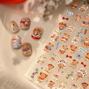 Cute cartoon bear nail stickers with gold foil festive elements on white ceramic tray
