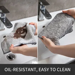 Absorbent bamboo charcoal fiber cleaning cloth showing oil removal before and after washing