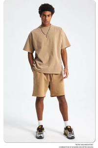 Men khaki cotton t-shirt and drawstring shorts set shown in a full body studio pose