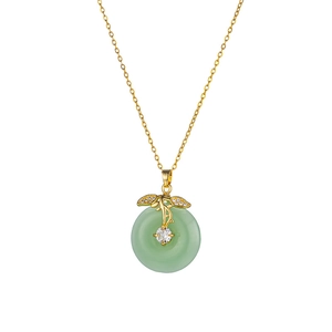 Titanium steel necklace featuring green faux jade peace buckle pendant with gold leaf accents