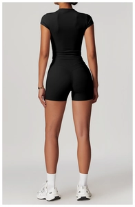 Rear view of women's tight fitness T-shirt with back details in black sports fabric