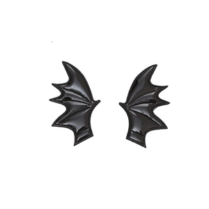 Detail of glossy black leather bat wings hair clips for Halloween party costume accessories