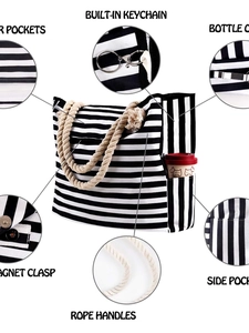 Classic black and white striped canvas tote bag with thick cotton rope handles and storage pockets