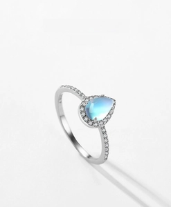 Detailed macro view of pear-shaped moonstone set in S925 sterling silver with zircon accents