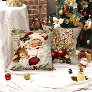 Set of two Christmas pillow covers with Santa and candy cane prints in festive scene
