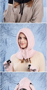 Detail of pink knitted balaclava with buttons and gloves featuring non-slip palm grip