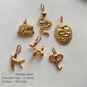 Various 14K gold plated stainless steel charms including elephant and bird pendants
