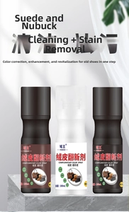 Trois flacons de spray rénovateur de couleur pour daim et nubuck sur marbre chic