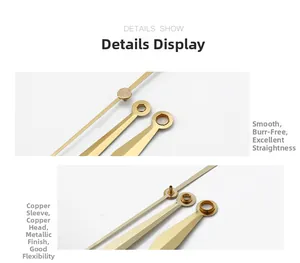 Close-up of polished gold clock hands with brass sleeve and smooth metallic texture