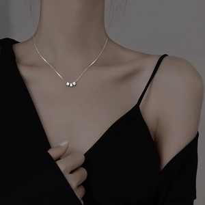 Minimalist S925 sterling silver necklace with three small cube pendants on a fine chain