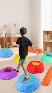 Detail of colorful anti-slip sensory balance stones and beam for kids obstacle courses