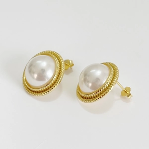 Elegant 925 sterling silver gold-plated earrings with large white pearls and twisted rope frames
