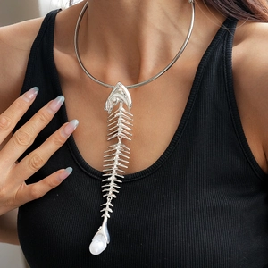 Exaggerated silver fishbone choker necklace with rhinestones for a bold fashion look