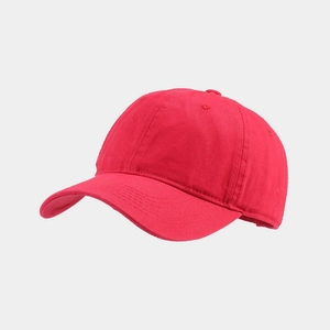 Detail of rose red cotton baseball cap featuring six-panel crown and curved brim
