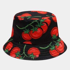 Close-up of black bucket hat featuring red tomato patterns and reinforced brim stitching
