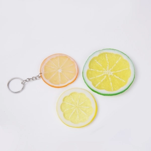 Realistic PVC lemon and orange slices keychains with clear fruit fiber texture