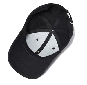 Detail view of baseball cap interior showing white reinforced lining and metal buckle