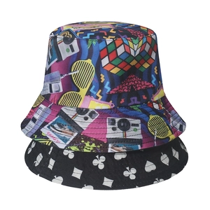 Reversible bucket hat with retro pop art tape and cards print for sun protection