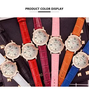 Elegant quartz women's watch with rhinestone bezel and leather strap in multiple colors
