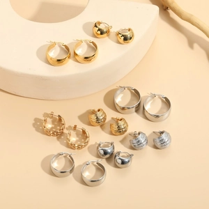 Luxurious geometric titanium steel hoop earrings in gold and silver polished finishes