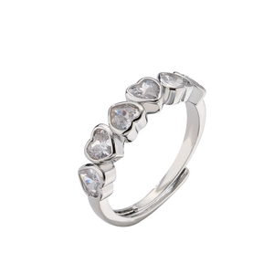 Adjustable silver ring with five heart-shaped cubic zirconia in a prong setting