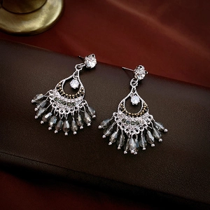 Ethnic style fan-shaped drop earrings with crystals and silver tassels on leather
