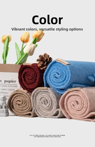 Soft wool blend scarves in various colors with fringe edges for winter warmth