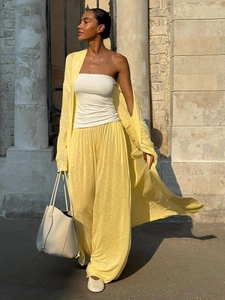 Three-piece yellow summer set featuring long cardigan, crop top, and wide-leg pants
