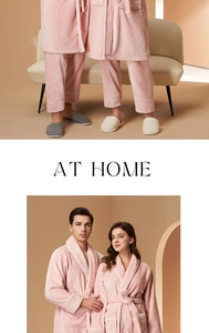 Detailed view of pink coral fleece bathrobe set with white piping and long straight pants