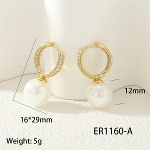 Macro detail of 12mm pearl earring with gold swirl and cubic zirconia measurements