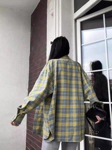 Relaxed fit long sleeve plaid shirt in yellow and grey check shown from a back view